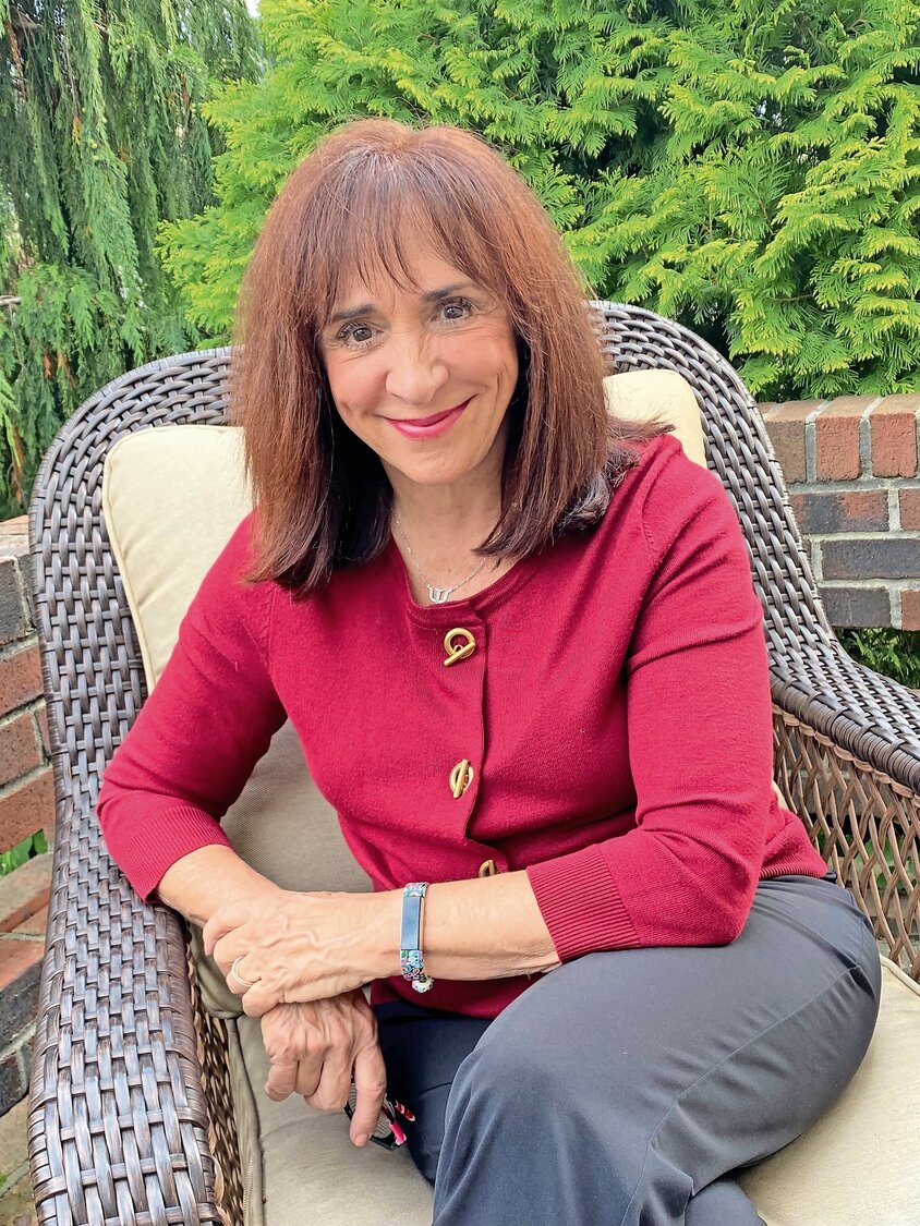 Please explain why Dr. Laurie Zelinger writes books Herald Community